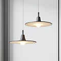 Modern Two Circular Black Pendant Lights Illuminated By Window With White Wall 3d model