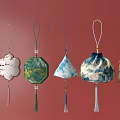Traditional Colorful Hanging Ornaments With Various Shapes And Tassels On Red Background