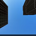 Tall Modern Office Building Exterior Design With Glass Curtain Walls And Blue Sky