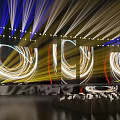 Grand Event Venue With Stage Lighting And Audience Seats
