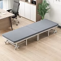 Gray Folding Bed With Wheels In Office Area Near Desk Chair And Plant