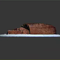 Freshly Baked Banana Bread with Slices on White Ceramic Plate