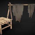 Rustic Wooden Frame with Hanging Cloths and Simple Wooden Stool