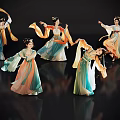 Women Elegantly Dancing In Ancient Costumes With Flowing Robes And Sleeves