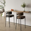 Stylish Modern Wooden Bar Counter With Two Leather Bar Stools Green Plant And Oranges