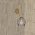 Stylish Wall Sconce with Glass Globe Shade and Illuminated Bulb on Textured Wall