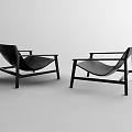 Two Black Leisure Chairs with Modern Wooden Frame and Comfortable Seat in Minimalist Style