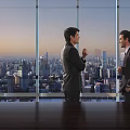 Modern Office Interior With Men In Suits Conversing By Large Windows And City Skyline