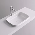Modern White Oval Shaped Countertop Washbasin With Silver Faucet in Minimalist Style