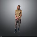Man Standing Against Gray Background In Brown T-shirt Gray Pants Blue Boots With Hands Crossed