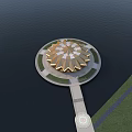 Golden Circular Building With Petal Roof On Waterfront And Green Lawn Pathway
