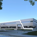Modern Industrial Factory Building With Large Glass Windows And Landscaped Exterior