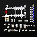 Assorted White And Brass Plumbing Fittings With Manifold Valves And Connectors Components