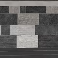 Natural Stone Accent Wall With Mixed Color Tiles And Textured Surfaces For Modern Home Decor