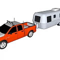 Red Pickup Truck Utility Vehicle Towing Silver Camper Trailer on Road