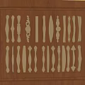 Collection of Golden Handles With Different Designs Displayed On Wooden Background