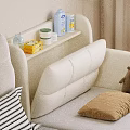 White Baby Crib With Headboard Side Shelf Holding Toiletries Striped Pillow Brown Teddy Bear