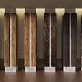 Column Capitals With Various Wood Grains And White Bases Arranged In Row