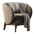 Beige Velvet Armchair With Geometric Pillow And Striped Blanket On Wooden Legs