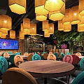 Vibrant Hotpot Restaurant Interior With Yellow Pendant Lights Colorful Chairs Round Tables And Green Plants