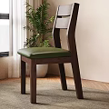 Walnut Wooden Dining Chair With Slatted Back Green Leather Seat And Potted Plant