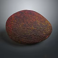 Reddish Brown Avocado With Yellow Spots On Textured Surface Against Dark Background