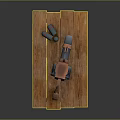 Heavy Weapon With Red Circular Details Metallic Body And Brown Grip On Simple Wooden Table
