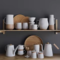 White Ceramic Dinnerware Set With Mugs Jugs Plates Wooden Tray And Wicker Placemats On Shelf