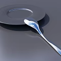 Modern Sleek Tableware Set with Plate and Spoon on Dark Surface