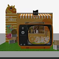Vibrant Orange TV Shaped Photo Check-in Spot With Perfect Festival Decorations And Green Grass
