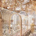 Luxurious Banquet Hall With Golden Floral Decor Ornate Archway White Tables and Chairs Marble Floor