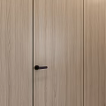 Modern Wooden Hinged Doors With Various Wood Grain Colors And Black Handles