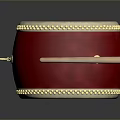 Traditional Red Drum With White Head Golden Decorations And Wooden Drumsticks