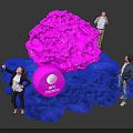 People Interacting With Pink Installation And IBC Amsterdam Logo On Blue Carpet