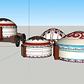 Traditional Mongolian Yurts With Ornate Patterns And Mobile Wooden Cart Design
