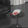 Elegant White Speckled Ceramic Vessel With Red Cherries On Black Coffee Table In Living Room