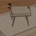 Modern Wooden Stool With Beige Upholstered Seat On Woven Rug In Living Room Space