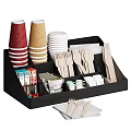 Disposable Colored Cups In Black Organizer Tray With Wooden Utensils Sugar Packets And Tea Bags