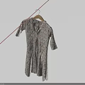 Light Colored Patterned Short Sleeve Shirt Dress Hanging on Wooden Hanger