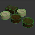 Round Metal Cans With Gold Lids And Brown Box On Dark Surface