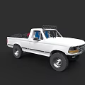 White Pickup Truck with Roof Rack Red Seats and Off Road Tires