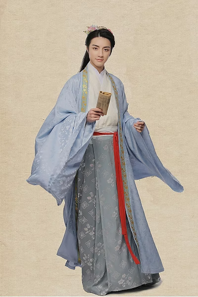Man in Light Blue Traditional Clothing Holding Scroll with Patterns Gray Skirt and Red Trim 3d model