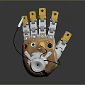Potato Shaped Robotic Mechanical Device With Yellow Fingers And Metal Components