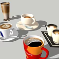 Coffee Cups with Latte Heart Art Black Coffee Kenco Brand and Spoons on Saucers