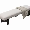 Modern Beige Padded Bench With Black Legs And Light Gray Blanket