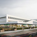 Modern Commercial Complex Exterior With Glass Facade Storefronts And Outdoor Pedestrian Area