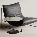 Modern Minimalist Black Leather Leisure Chair with Metal Frame and Small Round Side Table