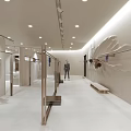 Modern Fashion Clothing Store Interior With Mirrors Plants And Display Area