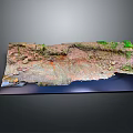 Detailed Terrain Model Showcasing Natural Rocks Vegetation Soil Layers And Water