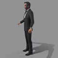 Man in Black Suit White Shirt And Tie Standing With Arms Outstretched Against Gray Background